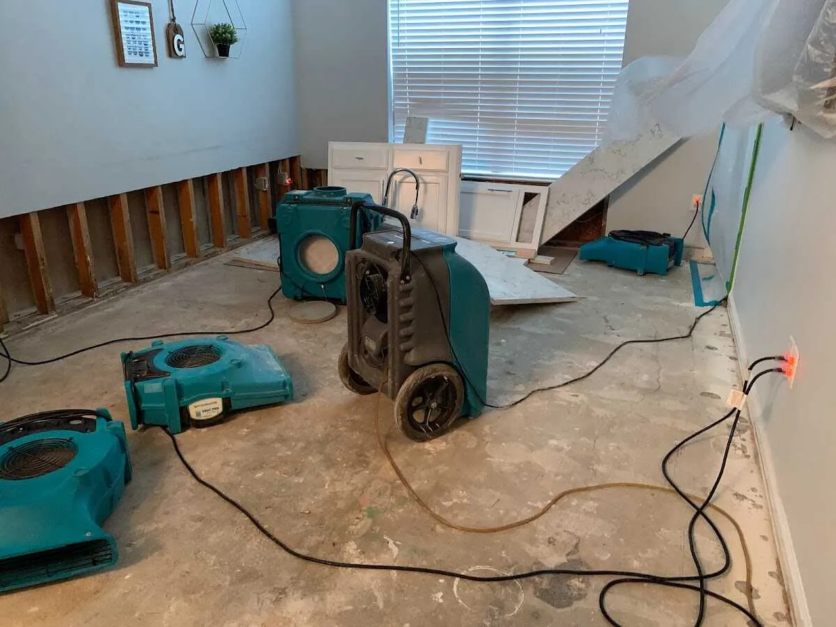 Dehumidifier in flood-cut room for Water Damage Restoration in Meriden